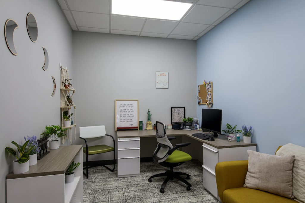 Office and counseling room with desk chairs and a couch at Northpoint imagine Fort Collins