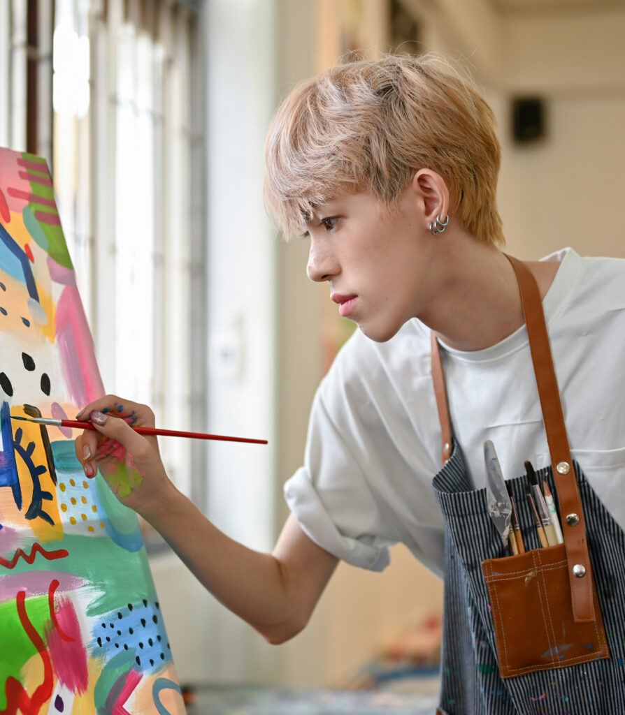 young person painting